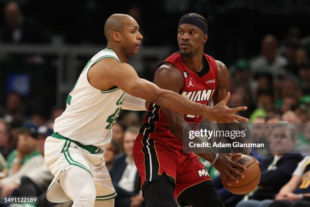 Jimmy Butler of the Miami Heat is defended by Al Horford of the Boston Celtics during the second quarter of game one of the Eastern Conference Finals...