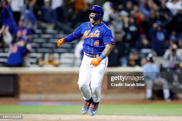 Francisco Alvarez of the New York Mets reacts after hitting a game-tying three-run home run during the ninth inning against the Tampa Bay Rays at...