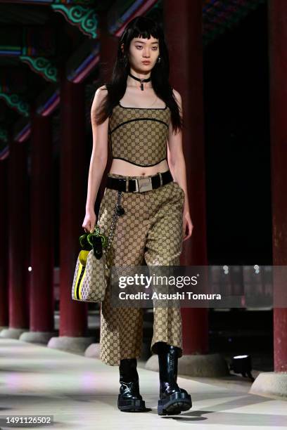 Model walks the runway during the Gucci Seoul Cruise 2024 fashion show at Gyeongbokgung Palace on May 16, 2023 in Seoul, South Korea.