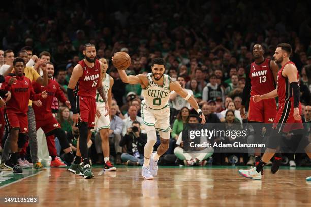 Jayson Tatum of the Boston Celtics reacts after a turnover against the Miami Heat during the fourth quarter of game one of the Eastern Conference...