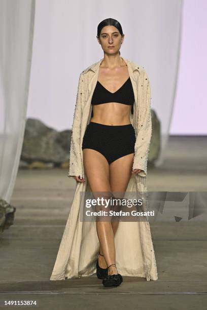 Model walks the runway during the Albus Lumen show during Afterpay Australian Fashion Week 2023 at Carriageworks on May 18, 2023 in Sydney, Australia.