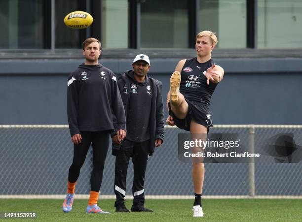 Harry Lemmey of the Blues kicks the ball during a Carlton Blues AFL training session at Ikon Park on May 18, 2023 in Melbourne, Australia.
