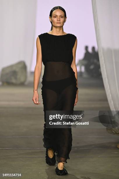 Model walks the runway during the Albus Lumen show during Afterpay Australian Fashion Week 2023 at Carriageworks on May 18, 2023 in Sydney, Australia.