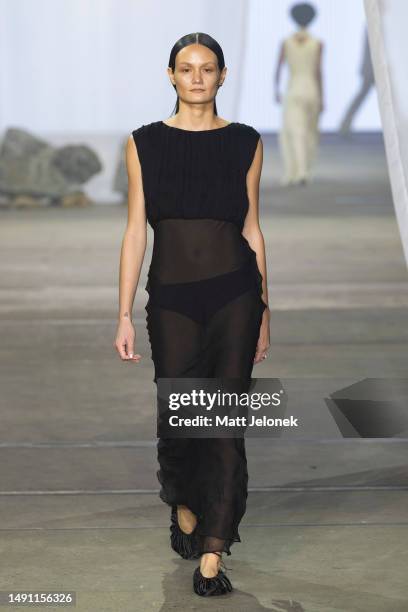 Model walks the runway during the Albus Lumen show during Afterpay Australian Fashion Week 2023 at Carriageworks on May 18, 2023 in Sydney, Australia.