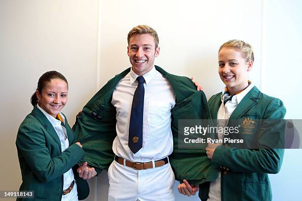 Loudy Tourky, Matthew Mitcham and Brittany Broben of Australia pose during previews ahead of the London Olympic Games at the Aquatics Centre in...