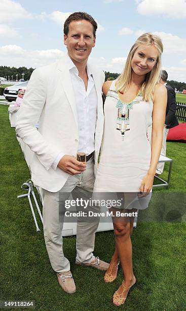 Brendan Cole and Zoe Hobbs attend the Audi International Guards Polo at Guards Polo Club on July 22, 2012 in Egham, United Kingdom.