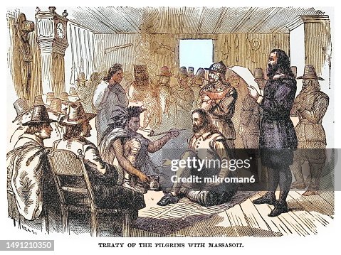 Old engraved illustration of the Pilgrim-Wampanoag Peace Treaty between Plymouth Colony governor John Carver and Wampanoag chief Massasoit (1621 CE.)