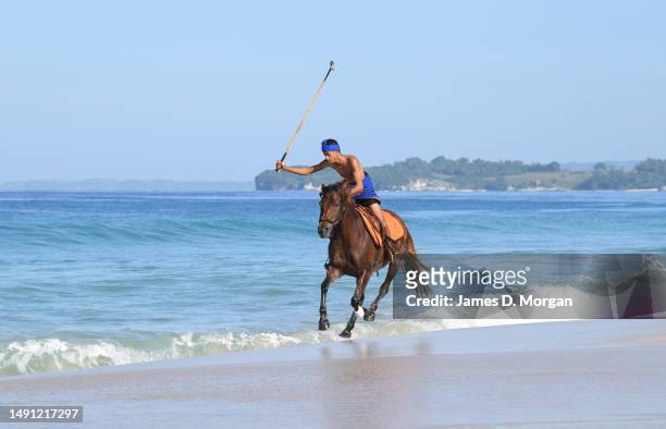Local horseman at the resort of Nihi Sumba illustrates playing beach polo on the sand beside the resort on May 01, 2023 in Sumba, Indonesia. Judged...