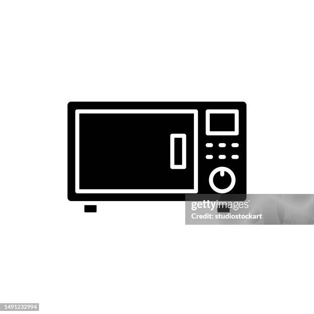microwave flat icon - person using microwave stock illustrations