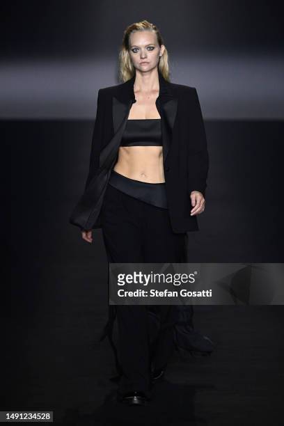 Gemma Ward walks the runway during the Cue - Presented by Afterpay show during Afterpay Australian Fashion Week 2023 at Carriageworks on May 18, 2023...