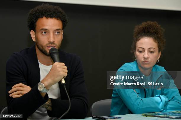 Felipe Anderson of SS Lazio and Silvia Vivirito of Lazio Women speak as SS Lazio players meet students at the "Pascal" school on May 18, 2023 in...