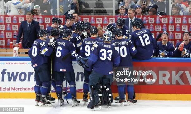 Finnish players react during the time out with head coach Jukka Jalonen during the 2023 IIHF Ice Hockey World Championship Finland - Latvia game...