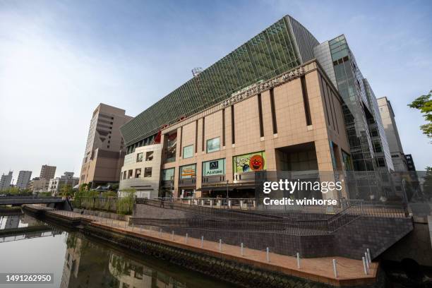 hakata riverain mall by takashimaya in fukuoka, japan - fukuoka city stock pictures, royalty-free photos & images