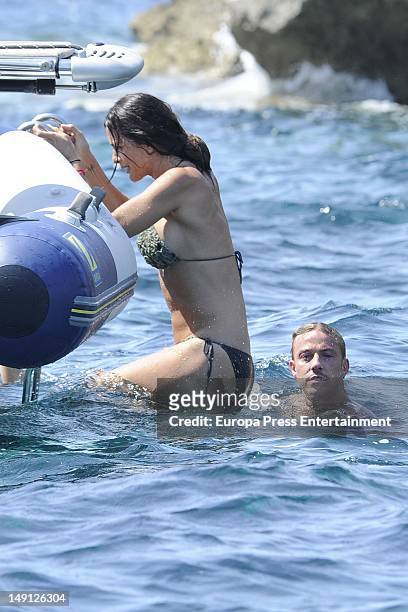 Spanish footballplayer Guti and his girlfriend Romina Belluscio, several months pregnant, are seen on a yacht on July 21, 2012 in Ibiza, Spain.