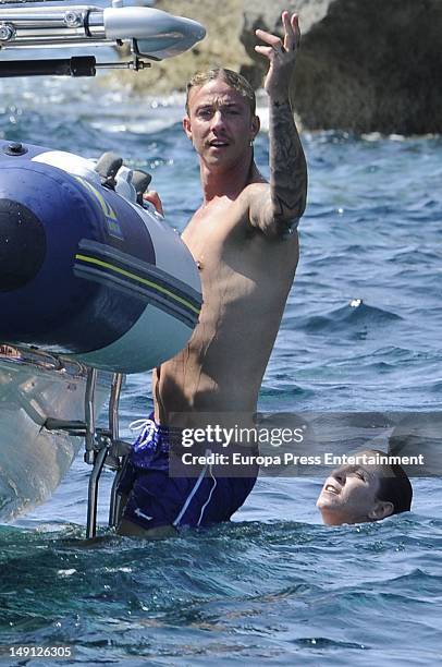 Spanish footballplayer Guti and his girlfriend Romina Belluscio, several months pregnant, are seen on a yacht on July 21, 2012 in Ibiza, Spain.