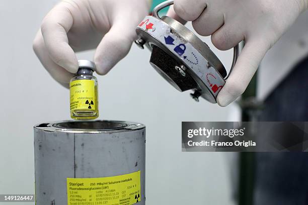 An employee works at the NSA radiopharmaceutical plant on July 08, 2011 in Aedea Rome, Italy. Nuclear Specialists Associated, Radiopharmacy,...