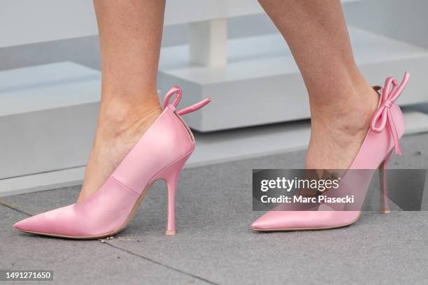 Virginie Ledoyen, shoe detail, attends the "Le Retour" photocall during the 76th Cannes Film Festival
