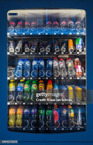 soft drinks at the vending machine - chocolate milk bottle stock pictures, royalty-free photos & images