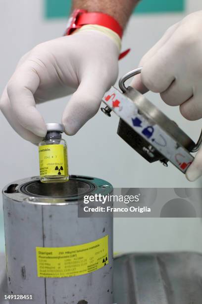 An employee works at the NSA radiopharmaceutical plant on July 08, 2011 in Aedea Rome, Italy. Nuclear Specialists Associated, Radiopharmacy,...