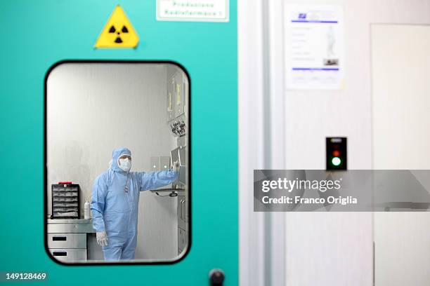 An employee works at the NSA radiopharmaceutical plant on July 08, 2011 in Aedea Rome, Italy. Nuclear Specialists Associated, Radiopharmacy,...