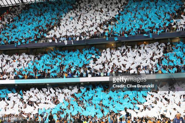 Manchester City fans show their support prior to the UEFA Champions League semi-final second leg match between Manchester City FC and Real Madrid at...