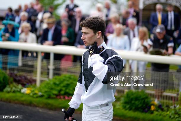 Oisin Murphy enters the parade ring at York Racecourse on May 18, 2023 in York, England.