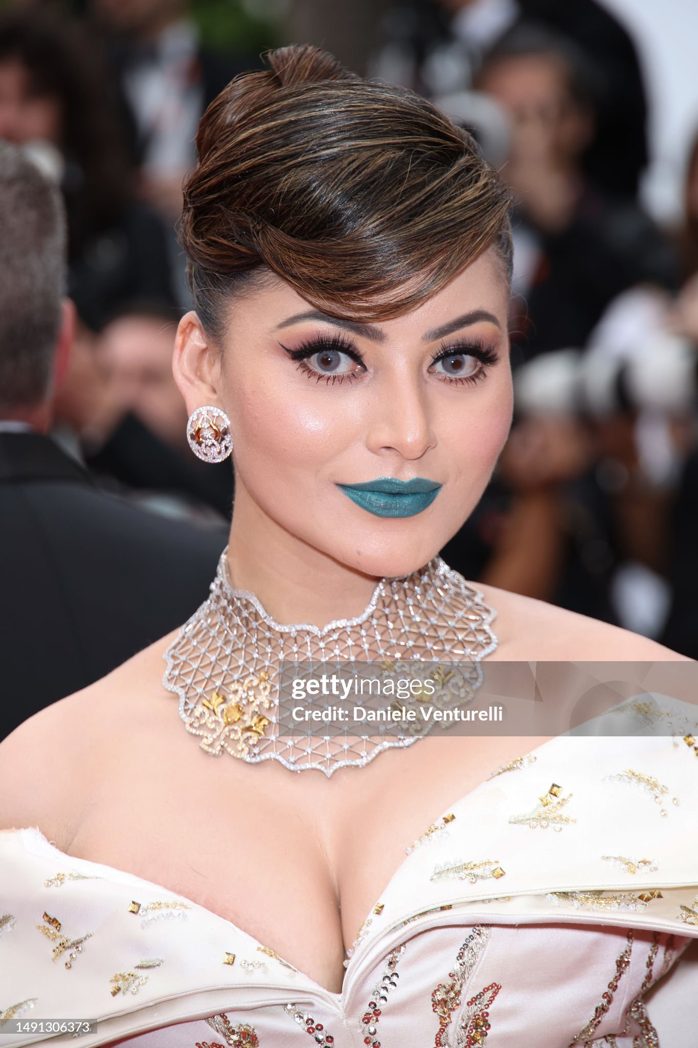 urvashi-rautela-attends-the-indiana-jones-and-the-dial-of-destiny-red-carpet-during-the-76th.jpg
