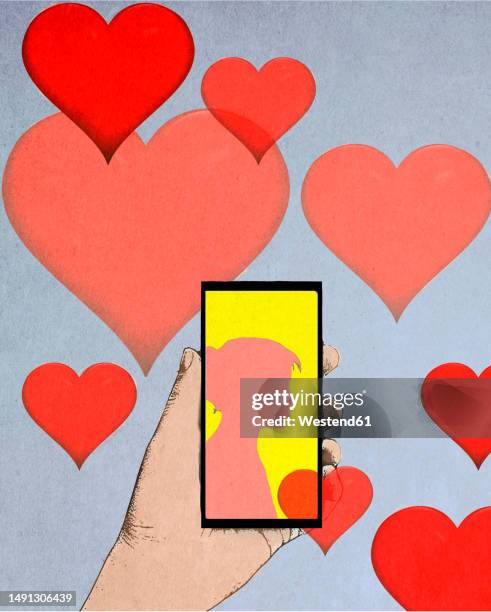 illustration of hearts floating over hand of person holding smart phone displaying silhouette of woman - mobile app stock illustrations