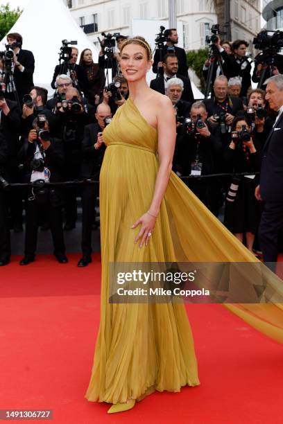 Karlie Kloss attends the "Indiana Jones And The Dial Of Destiny" red carpet during the 76th annual Cannes film festival at Palais des Festivals on...