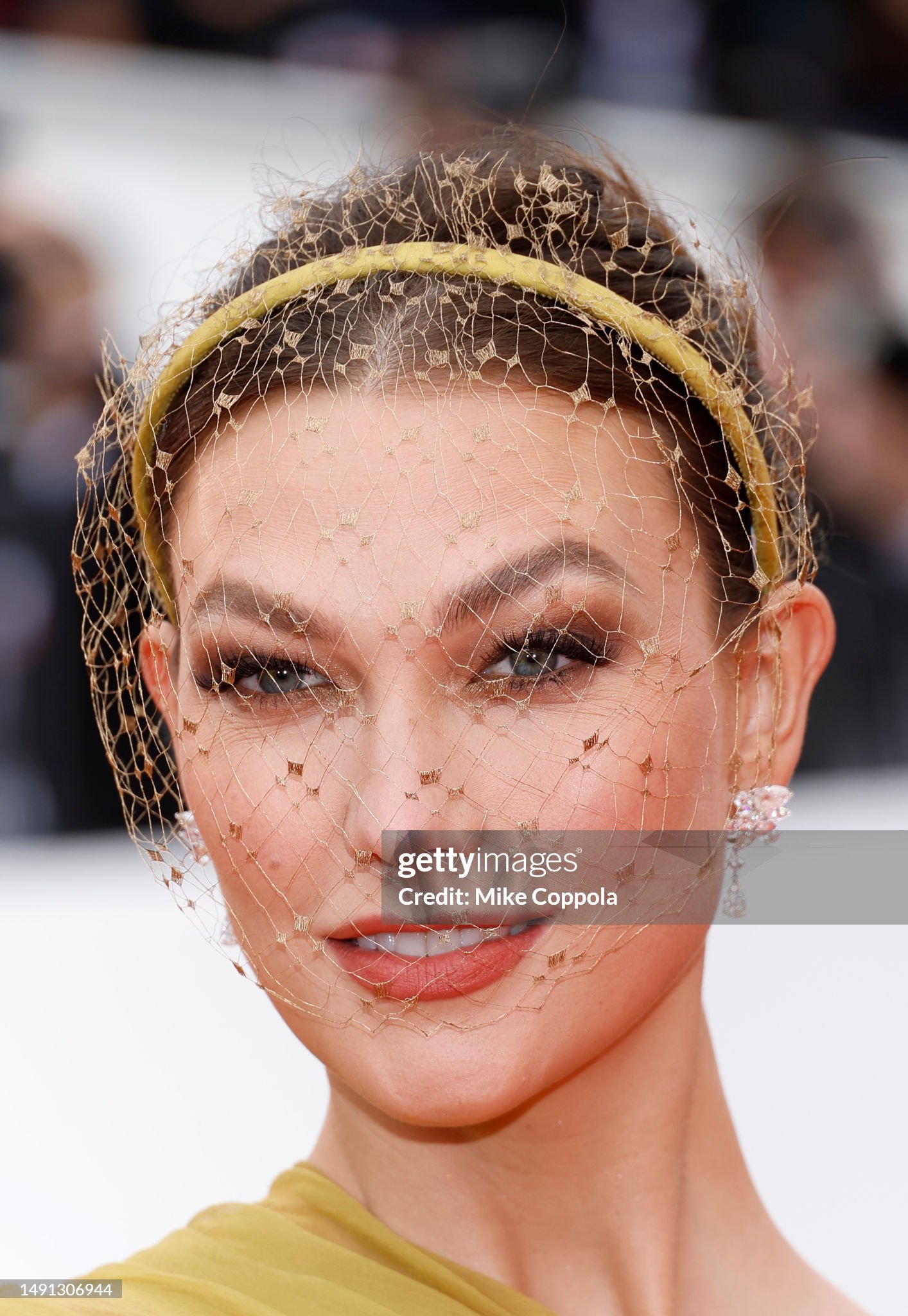 karlie-kloss-attends-the-indiana-jones-and-the-dial-of-destiny-red-carpet-during-the-76th.jpg