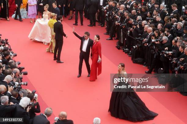 Jean-Michel Jarre, Gong Li and Sveva Alviti attend the "Indiana Jones And The Dial Of Destiny" red carpet during the 76th annual Cannes film festival...