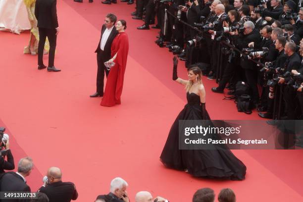 Jean-Michel Jarre, Gong Li and Sveva Alviti attend the "Indiana Jones And The Dial Of Destiny" red carpet during the 76th annual Cannes film festival...