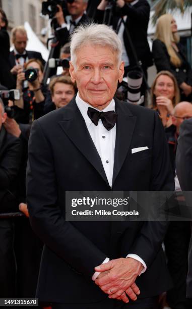 Harrison Ford attends the "Indiana Jones And The Dial Of Destiny" red carpet during the 76th annual Cannes film festival at Palais des Festivals on...