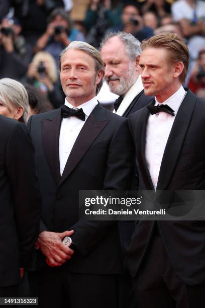 Mads Mikkelsen and Boyd Holbrook attend the "Indiana Jones And The Dial Of Destiny" red carpet during the 76th annual Cannes film festival at Palais...