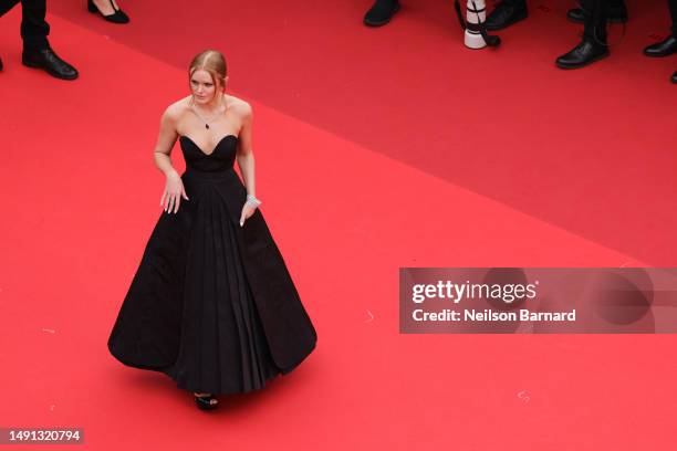 Abigail Cowen attends the "Indiana Jones And The Dial Of Destiny" red carpet during the 76th annual Cannes film festival at Palais des Festivals on...