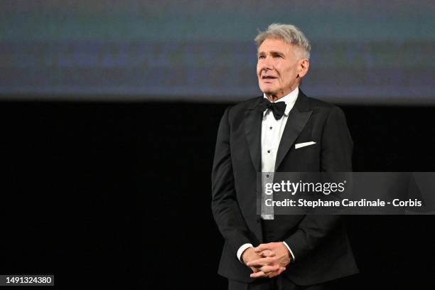 Harrison Ford receives an honorary Palme D'Or during the 76th annual Cannes film festival at Palais des Festivals on May 18, 2023 in Cannes, France.