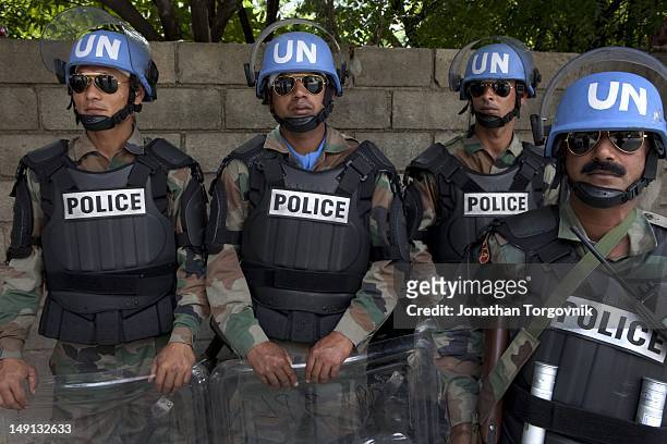 United Nations Peace Keeping Forces from India stand guard outside the Karibe hotel where Jean-Claude Duvalier, the former Haitian leader known as...