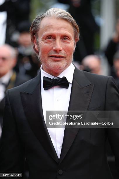 Mads Mikkelson attends the "Indiana Jones And The Dial Of Destiny" red carpet during the 76th annual Cannes film festival at Palais des Festivals on...