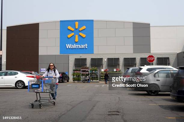 Customers shop at a Walmart store on May 18, 2023 in Chicago, Illinois. Walmart, the world's largest retailer, today reported first-quarter...