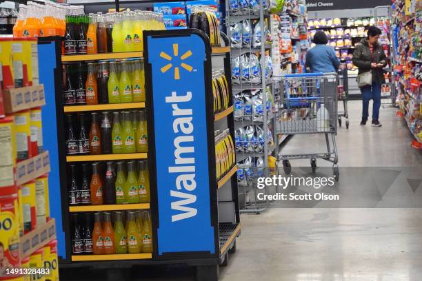 Customers shop at a Walmart store on May 18, 2023 in Chicago, Illinois. Walmart, the world's largest retailer, today reported first-quarter...