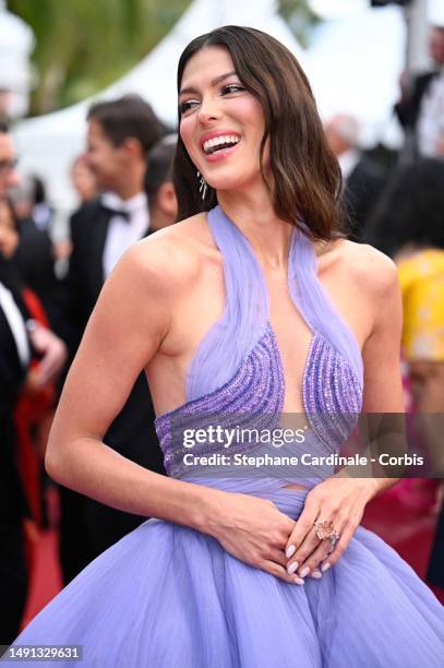 Iris Mittenaere attends the "Indiana Jones And The Dial Of Destiny" red carpet during the 76th annual Cannes film festival at Palais des Festivals on...