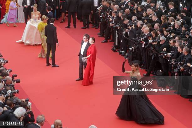 Jean-Michel Jarre and Gong Li attend the "Indiana Jones And The Dial Of Destiny" red carpet during the 76th annual Cannes film festival at Palais des...