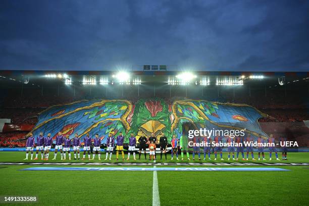 Basel fans display a tifo as the teams and officials line up prior to the UEFA Europa Conference League semi-final second leg match between FC Basel...