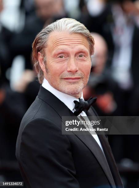 Mads Mikkelsen attends the "Indiana Jones And The Dial Of Destiny" red carpet during the 76th annual Cannes film festival at Palais des Festivals on...