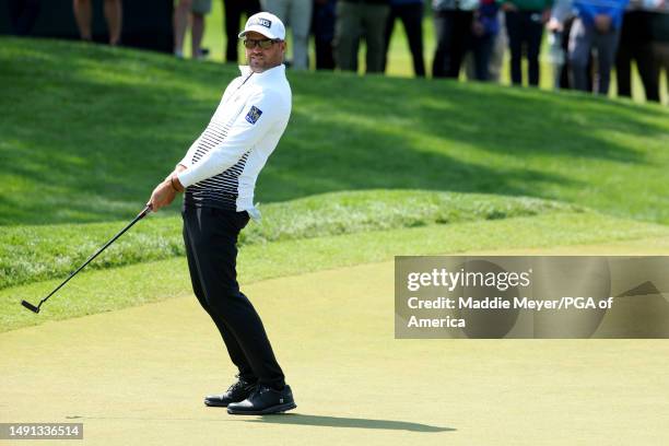 Corey Conners of Canada reacts on the 17th green during the first round of the 2023 PGA Championship at Oak Hill Country Club on May 18, 2023 in...