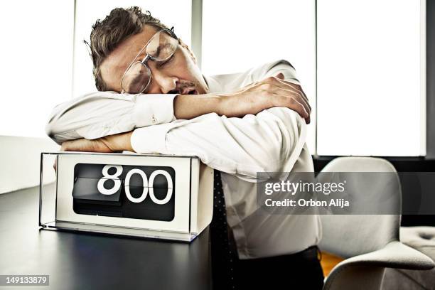 businessman sleeping at the office - chairman stock pictures, royalty-free photos & images