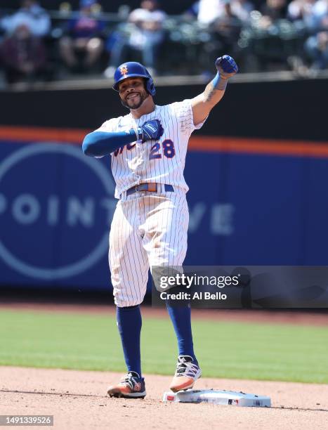 Tommy Pham of the New York Mets celebrates after hitting a double against the Tampa Bay Rays during their game at Citi Field on May 18, 2023 in New...