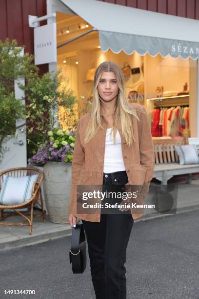 Sofia Ritchie poses as Laura Brown and Sézane fête the opening of their Brentwood Country Mart store on May 17, 2023 in Los Angeles, California.