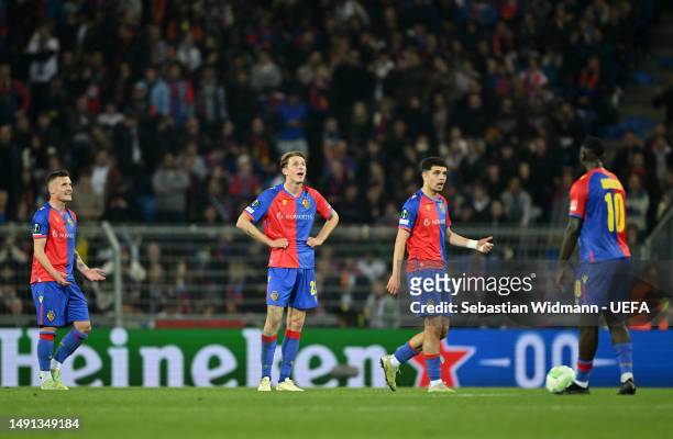 Taulant Xhaka, Wouter Burger, Zeki Amdouni and Jean Kevin Augustin of FC Basel look dejected after their side concede their second goal by Nicolas...
