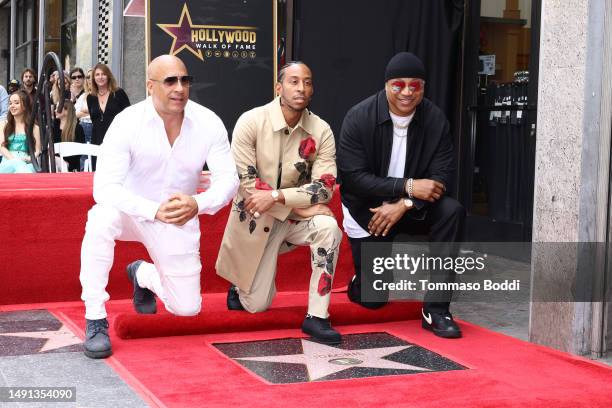 Vin Diesel, Ludacris, and LL Cool J attend a ceremony honoring Ludacris with a star on the Hollywood Walk of Fame on May 18, 2023 in Hollywood,...